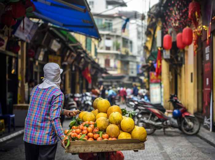 Small rural day market with traditional craft and food vendors. Image by Ngo Tuan Anh from Pixabay