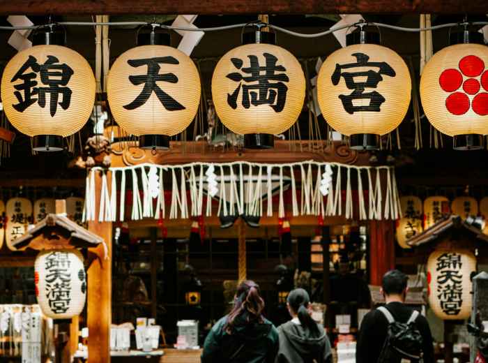 Traditional market stall displaying various local craft items. Photo by Diana Lisunova on Unsplash