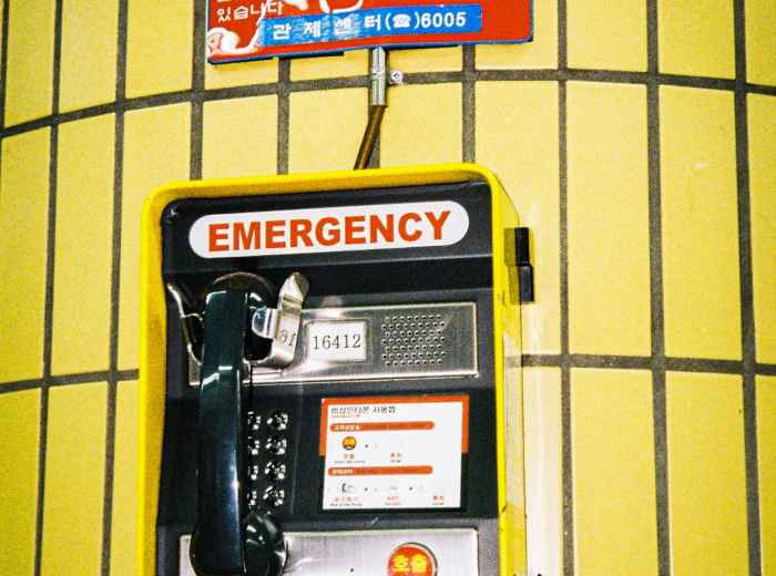Emergency information display in hotel lobby Photo by BBiDDac on Unsplash