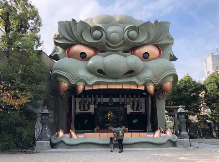  The dramatic lion head structure at Namba Yasaka Shrine with traditional architecture