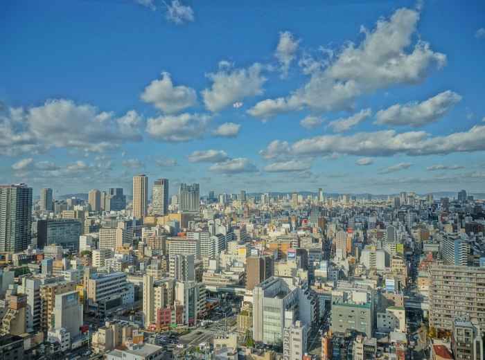 Panoramic cityscape of Osaka as seen from Tsutenkaku’s observation deck on a clear day. Image by Dong Chan Kim from Pixabay.