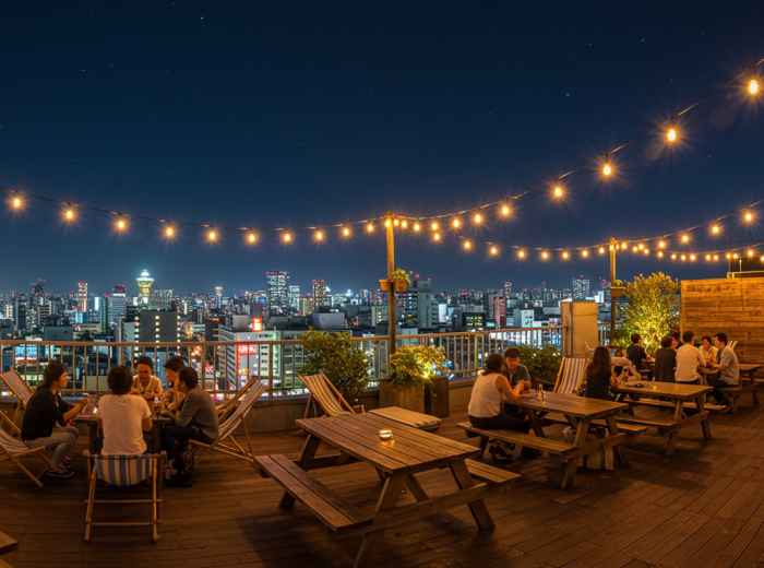 Rooftop beer garden with string lights and city views