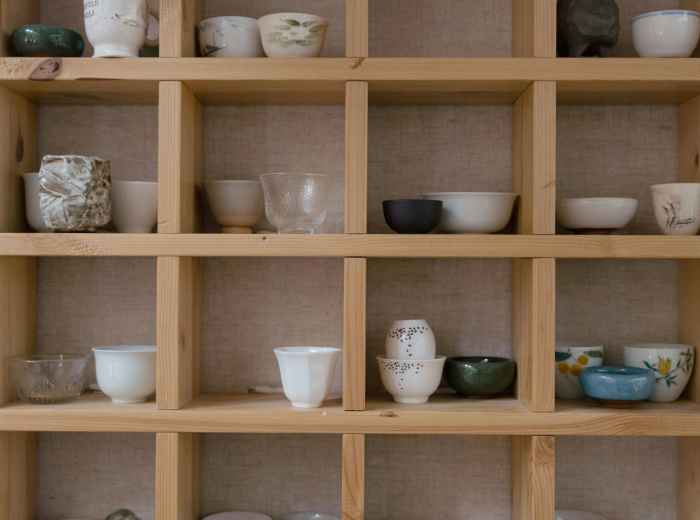 Display of handmade ceramic cups photo by Photo by Tima Miroshnichenko Pexels
