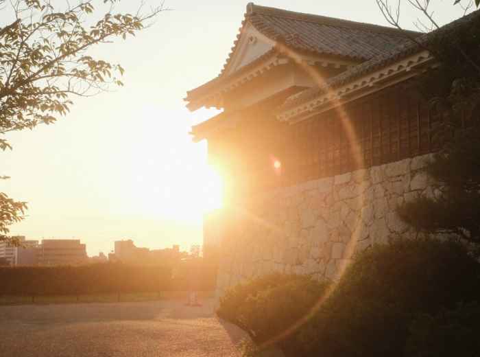  Peaceful temple courtyard at sunset with long shadows and golden light. Image by Mak from Unsplash