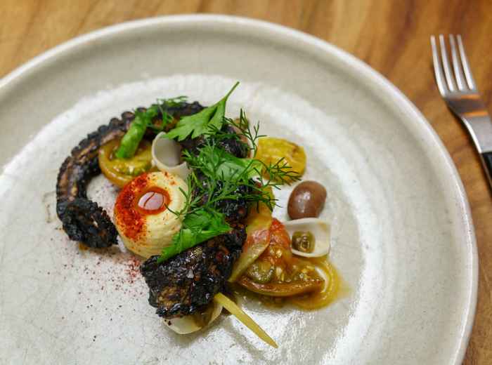 Octopus, Habanero Ink, Ayocote, Veracruzana Sauce, Pujol. Photo by Premshree Pillai, Flickr