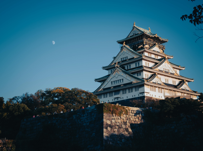 Osaka Castle with clear skies Photo by Thành Văn Đình Pexels