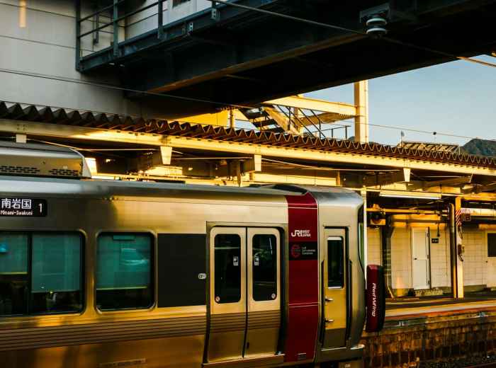 Train platform at golden hour Photo by Josiah Ferraro on Unsplash