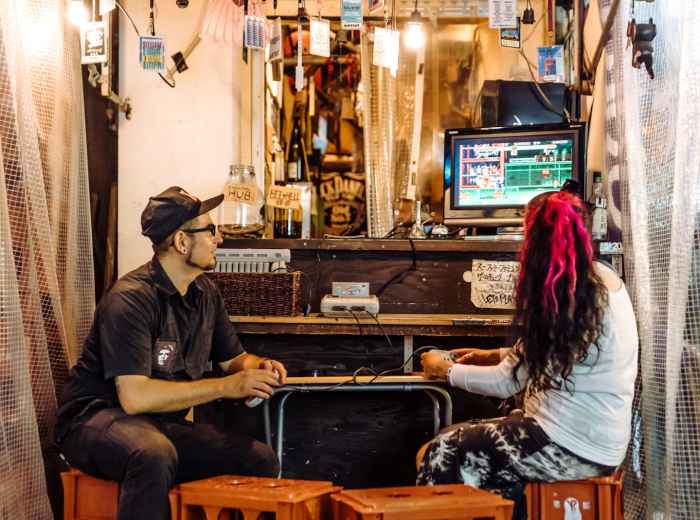 Small family restaurant in a residential area with locals enjoying a meal.