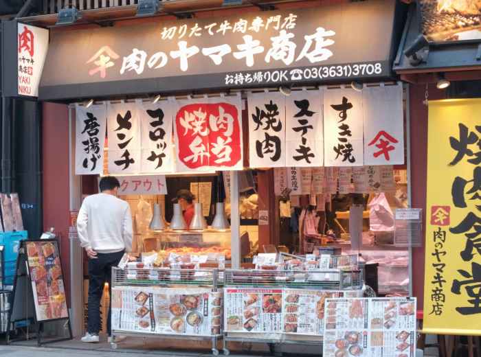 Tourists supporting a small local business near a famous Osaka attraction Photo by Mak on Unsplash
