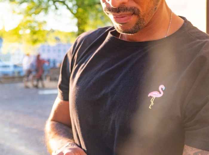 Host checking time while standing with travelers at a peaceful temple courtyard Image by Peggy und Marco Lachmann-Anke from Pixabay