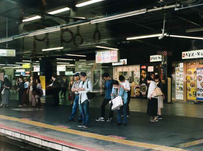 Busy platform at Namba Station during rush hour Photo by Frederica Diamanta on Unsplash