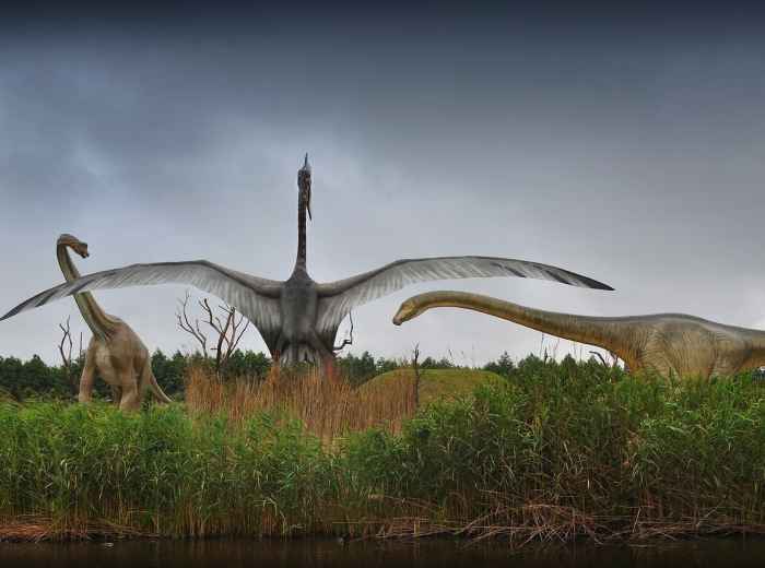Guests on the Jurassic Park water ride with realistic dinosaur animatronics. Image by Kazkar from Pixabay