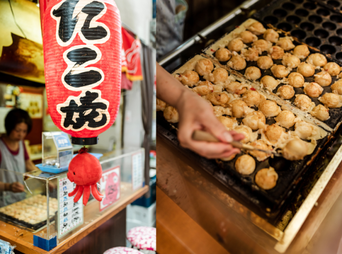 Close-up of takoyaki sizzling on a traditional hotplate.