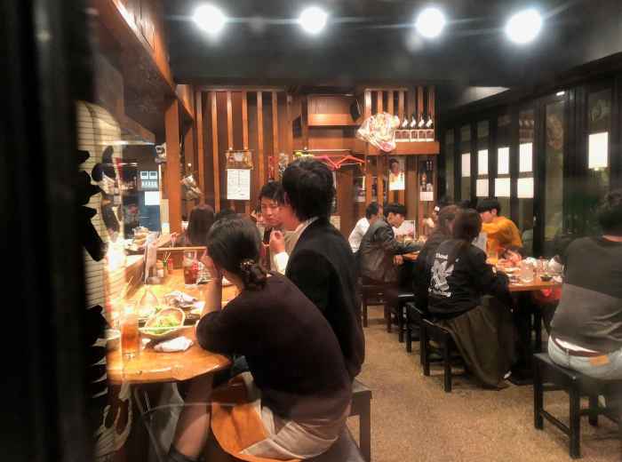 Patrons enjoying at a traditional restaurant.