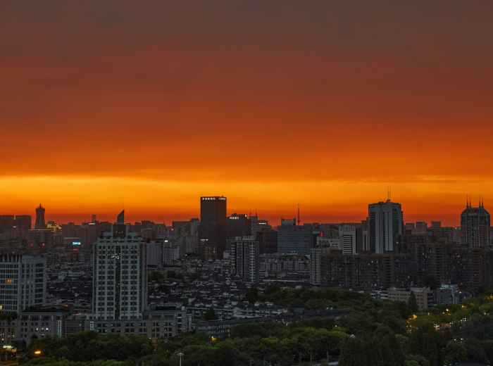 Sunset over Osaka cityscape from a high viewpoint photo by wuz-squid-JIeL7TGzjDE on unsplash