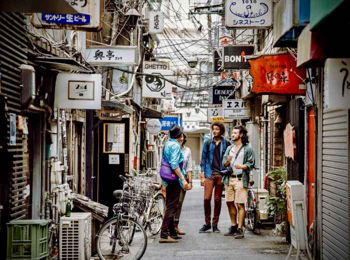 Guest an host exploring Tokyo.