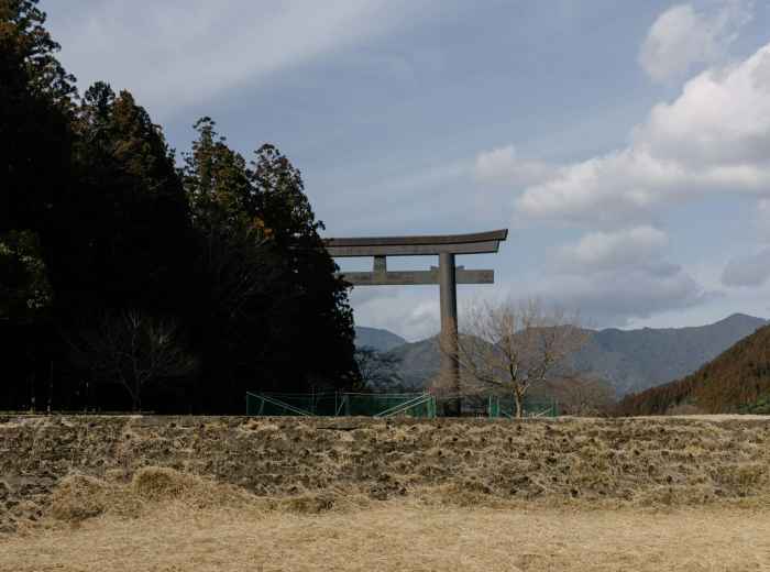 Remote section of Fushimi Inari with fewer torii gates and mountain forest Photo by Kieran on Unsplash