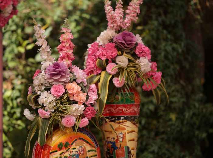 Seasonal flowers arranged in a traditional Japanese vase Photo by Abhishek Sharma on Unsplash