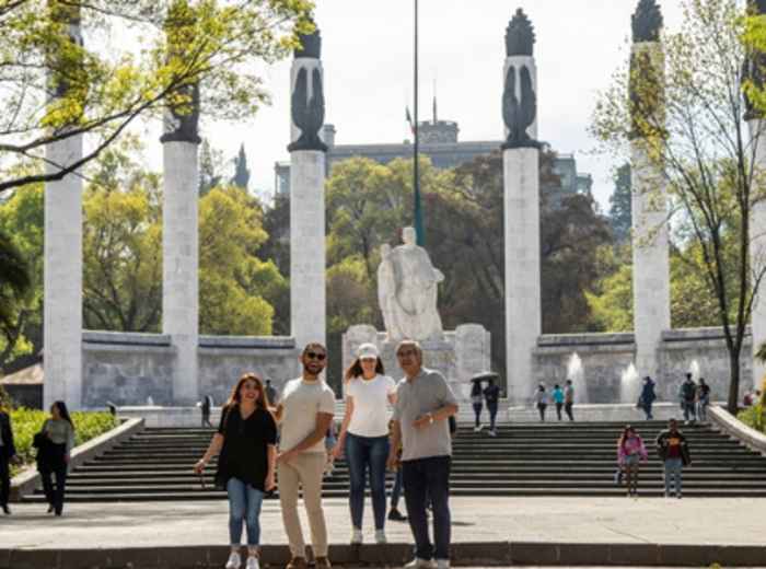 City Unscripted host and guests walking in Chapultepec Park