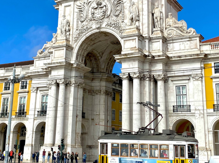 Arco da Rua Augusta with its ornate facade overlooking Praça do Comércio