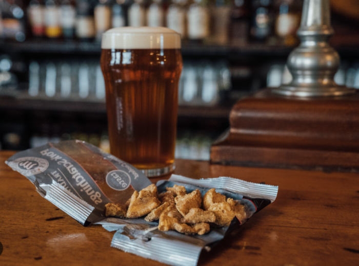 pork scratchings and pint of beer