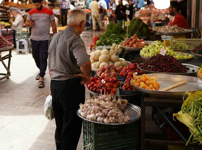 Morning market on Corso Italia with fresh lemons and other produce