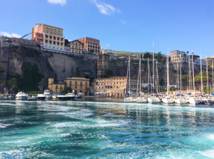 Morning ferries depart Marina Piccola toward Capri