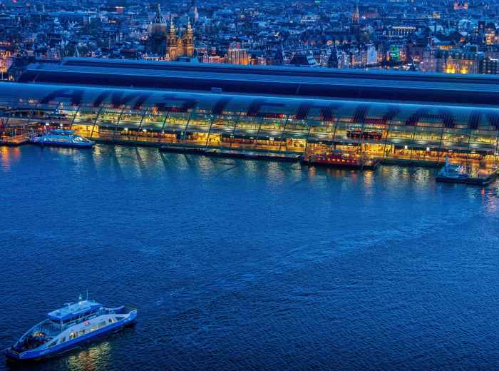 Free night ferry from Central Station with city lights on the water