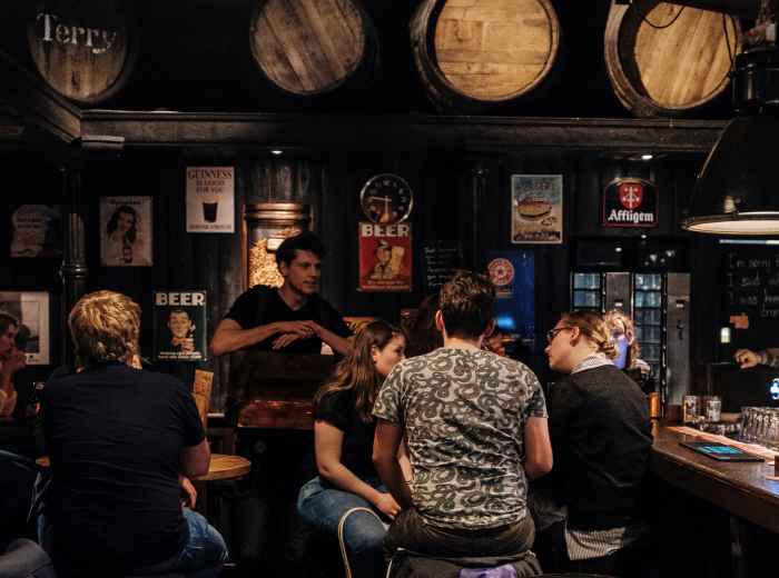 Traditional brown cafe with warm lights and wood interiors