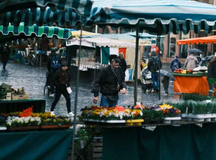 Early morning stalls in a Lombardy town square market