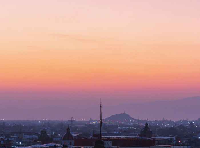 La Scala and Milan skyline at dusk