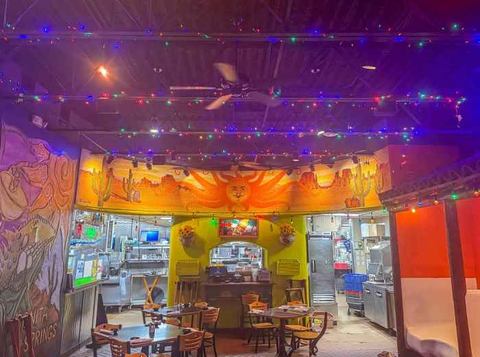 Small cantina interior with rainbow decorations