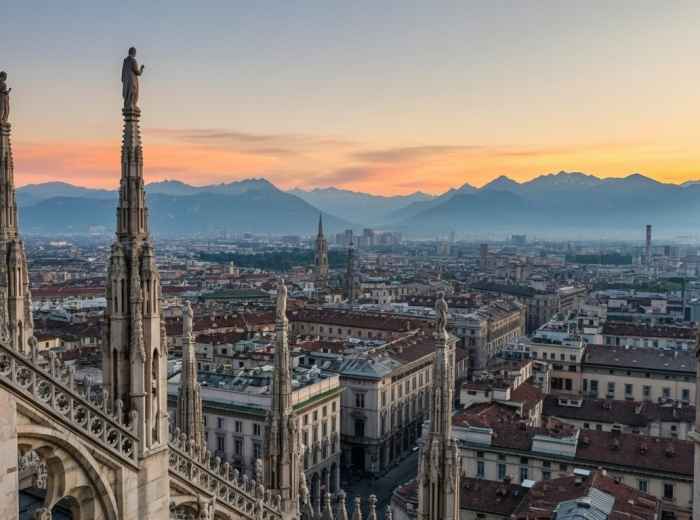 View from Milan Cathedral rooftop with Alps in the distance