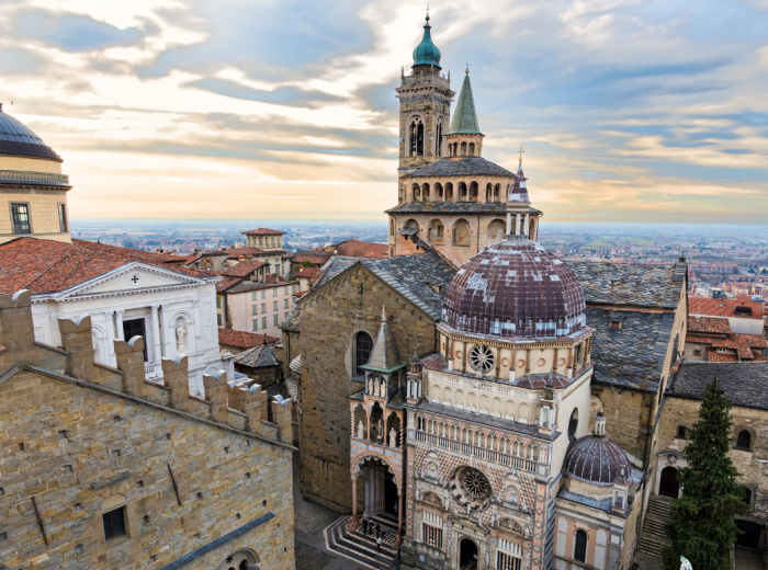 Medieval hilltop town with stone walls and narrow streets