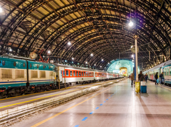 Milano Centrale platform with commuters boarding the train