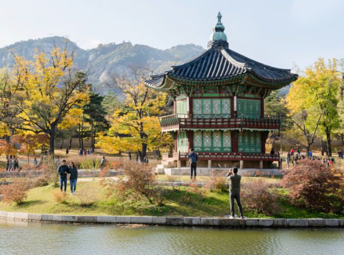Island in Gyeongbokgung Palace with visitor enjoying the view