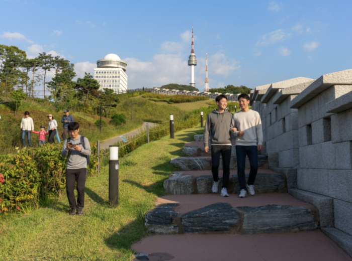 People walking the path in Namsan Park to Seoul Tower