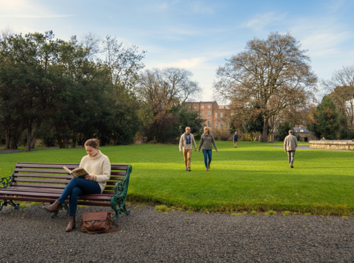 Early morning light and people strolling through Iveagh Gardens