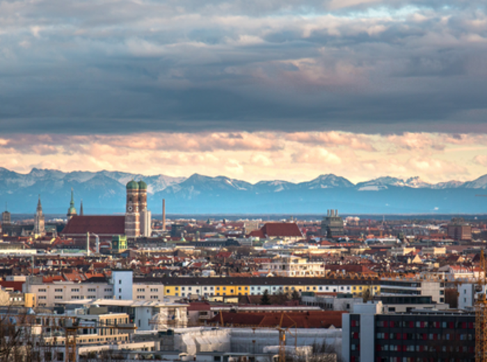 Beautiful city view of Munich with the Alps in the distance