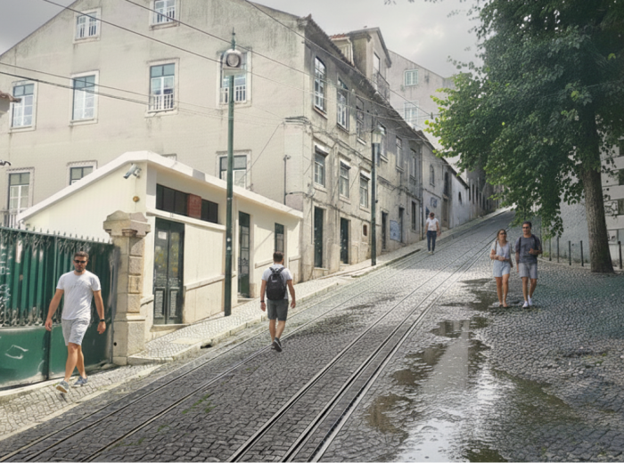 Wet cobblestone street in Lisbon with steep hill and tram tracks