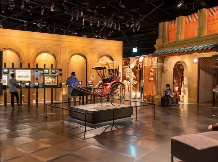 Visitors moving through the Singapore History Gallery