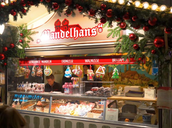 Neighborhood Christmas market stall in Munich with gingerbread hearts