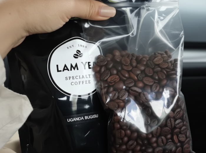 A bag of freshly ground coffee and beans at Lam Yeo Coffee Factory