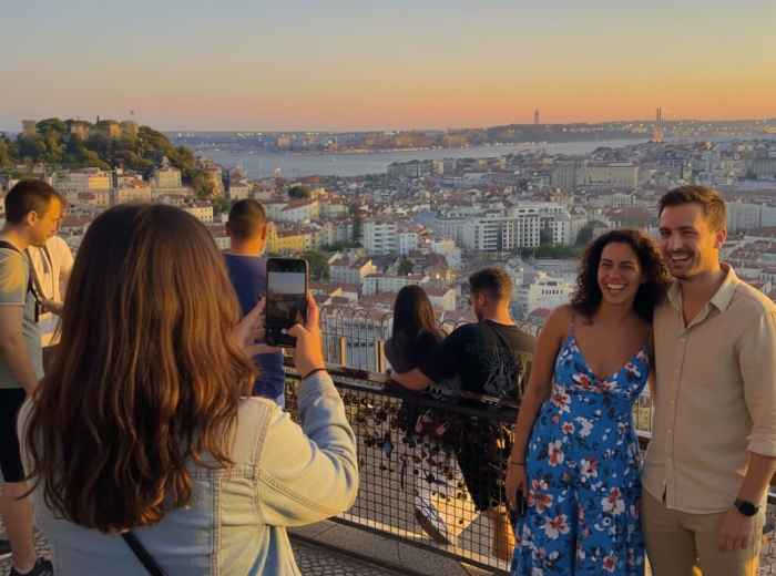 Panoramic view from Miradouro da Senhora do Monte, Lisbon skyline at sunset
