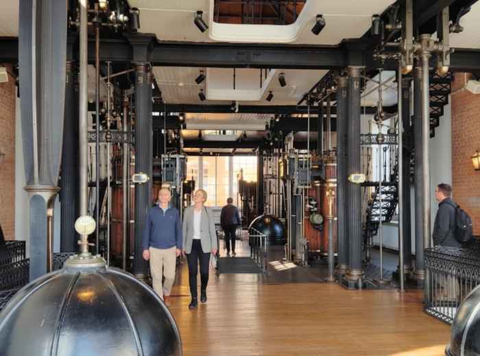 Interior of Museu da Água with old industrial machinery and pipes