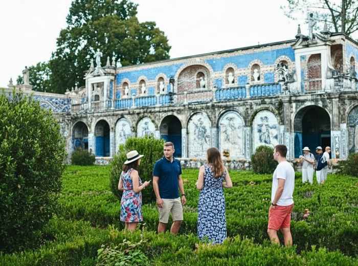 Formal gardens at Palácio dos Marqueses de Fronteira, with azulejo tiles and statues