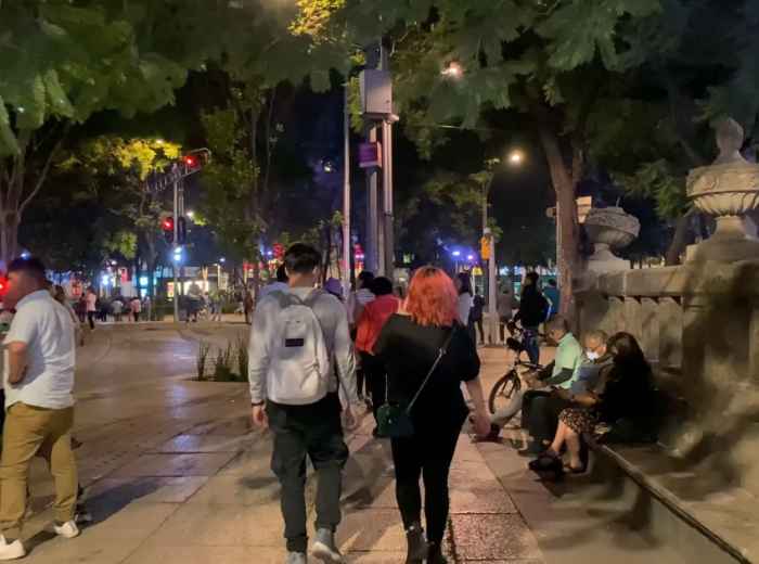 Busy Mexico City street in the evening