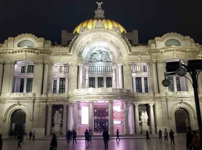People walking the steps of Bellas Artes after a performance
