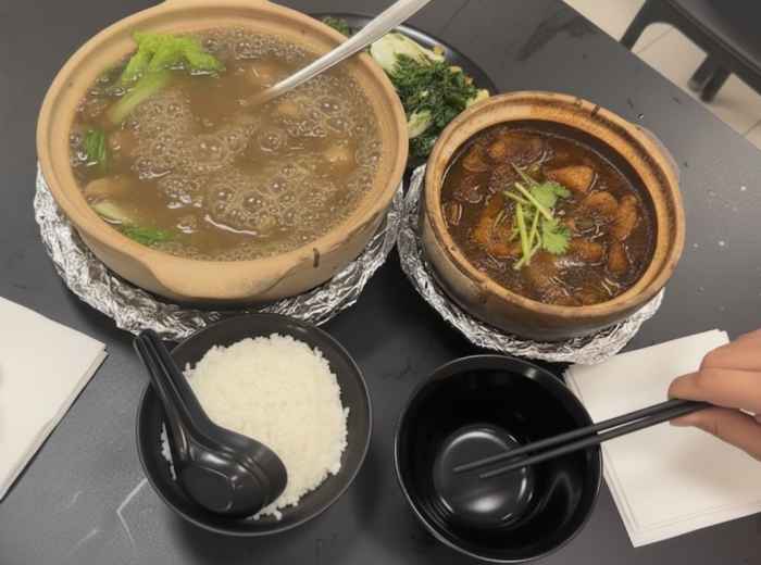 Dark peppery broth with fall-off-bone pork ribs and whole simmered garlic cloves
