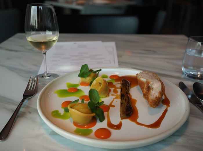 Elegant dinner tasting menu with seasonal ingredients and beautiful plating